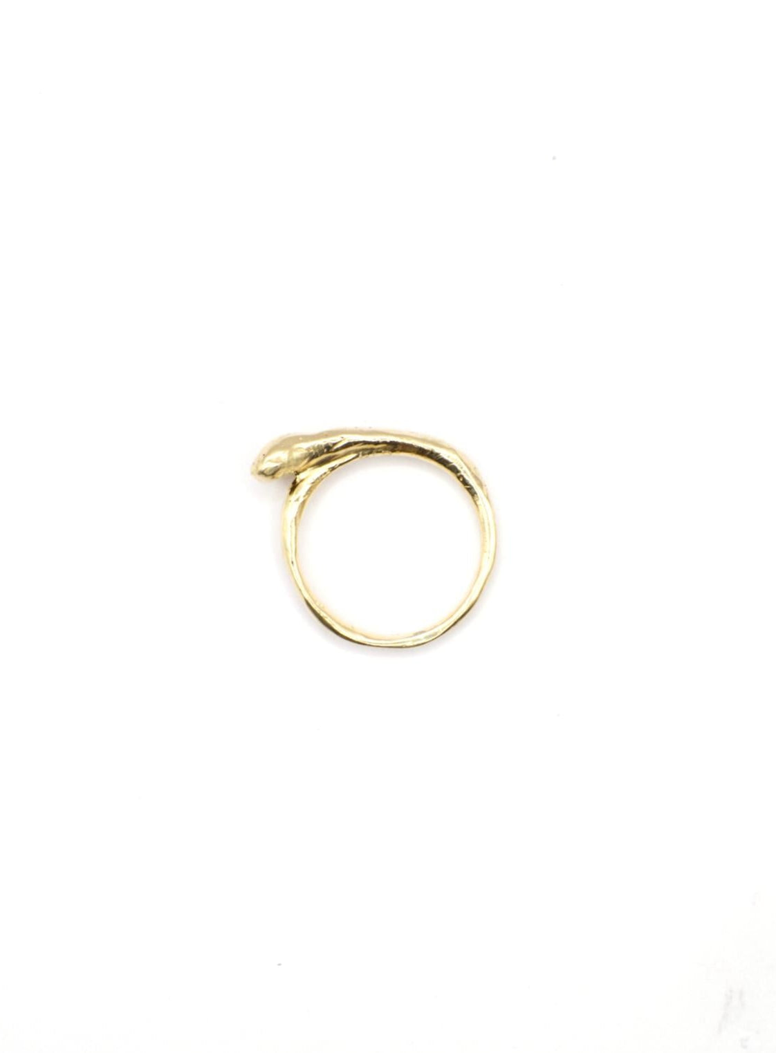 Gold bone ring on a white background